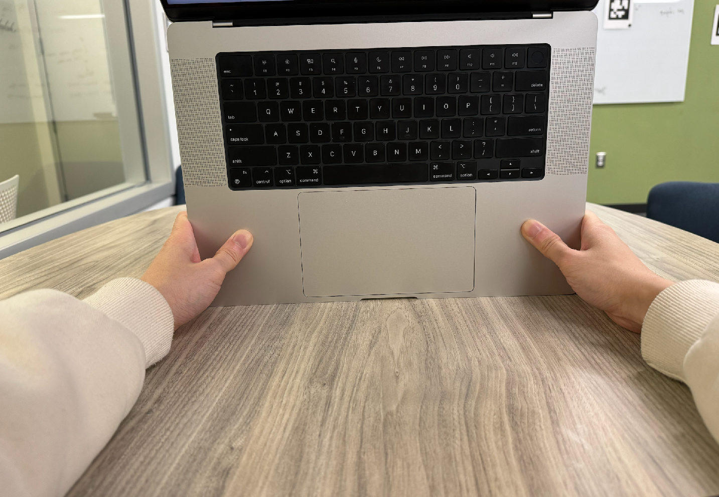 The front side of how to hold the mac